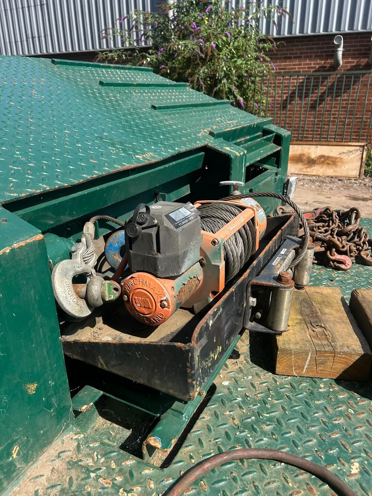 Rolats recovery trailer and winch used for loading vehicles for sea freight to Africa