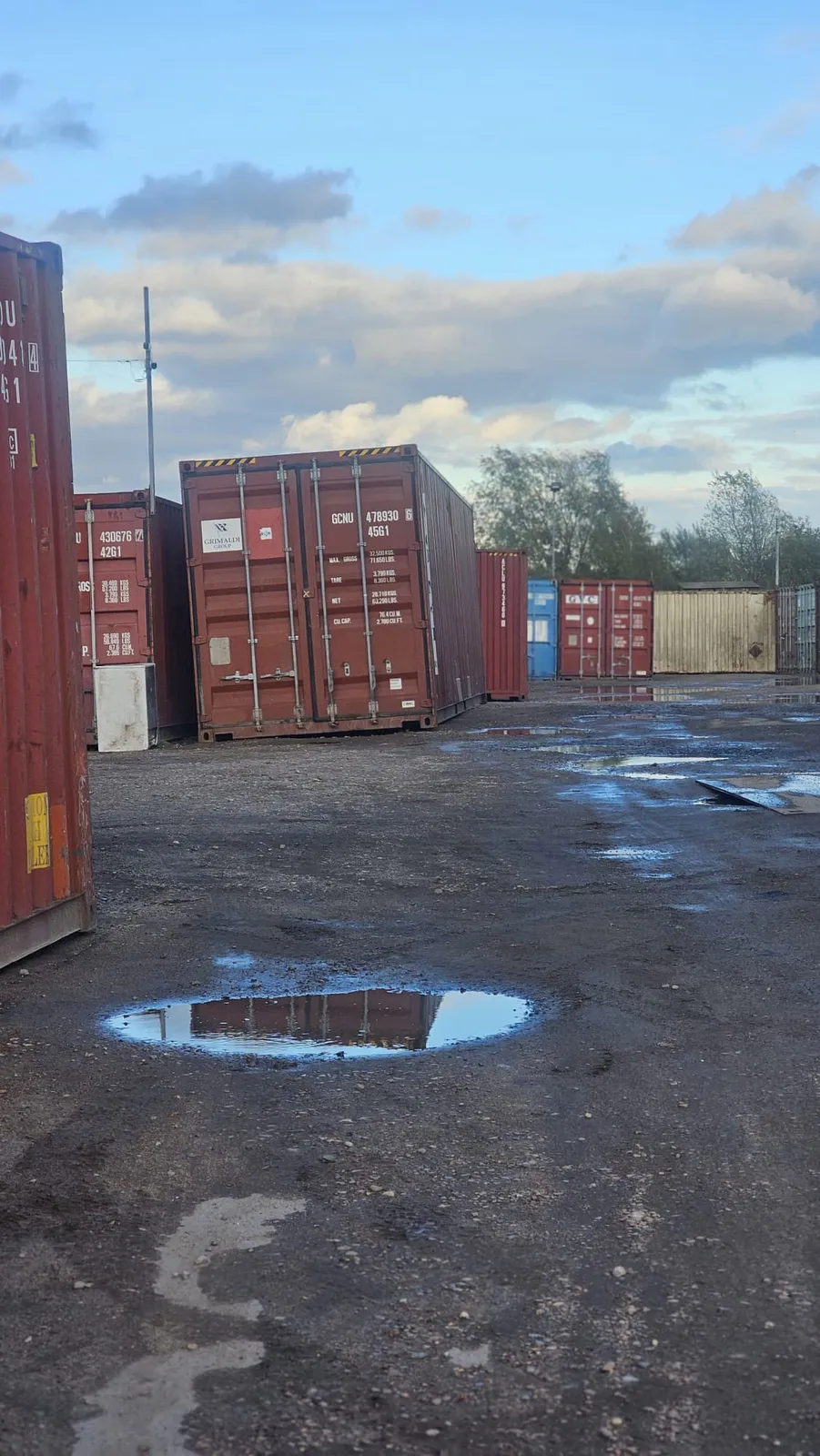 Rolats Services shipping container depot and storage yard in Dagenham with 20ft and 40ft containers for shipping to Africa